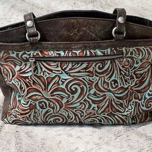 Patricia Nash turquoise purse. Purse is like new.